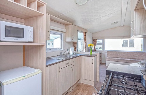 Prestatyn House | Caravan with one double and two twin.