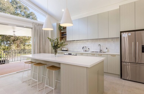 Culburra Beach House | Carramar - Fireplace - Absolute Waterfront