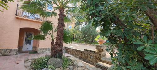 Palamos Villa | Casa única con jardín a 45 metros de la playa. BE
