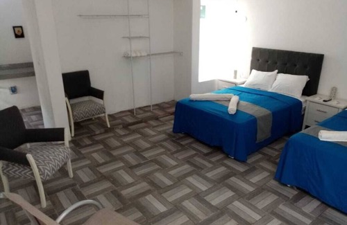 Chicxulub Puerto House | Casa con 5 habitaciones tipo estudio equipadas justo con lo necesario para estar