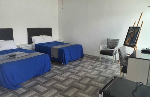 Chicxulub Puerto House | Casa con 5 habitaciones tipo estudio equipadas justo con lo necesario para estar