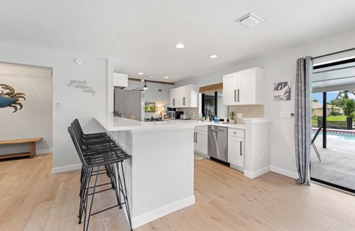 Cape Coral House | Casa de Crab: Gulf Access Waterfront 4 Bedroom and 3 Bathroom Home Heated Pool