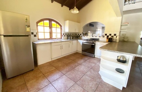 Noord Villa | Casa Galpy. Villa in Noord with private swimming pool and fitness room
