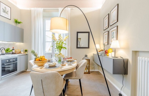Lucca Historical Center Apartment | Casa Gina, a modern charming urban retreat with free parking by the train station and the Walls of Lucca