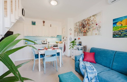 Viddalba Apartment | Casa Lidia, with Shared Pool, Private Parking and Garden; Bouganville Residence in Viddalba