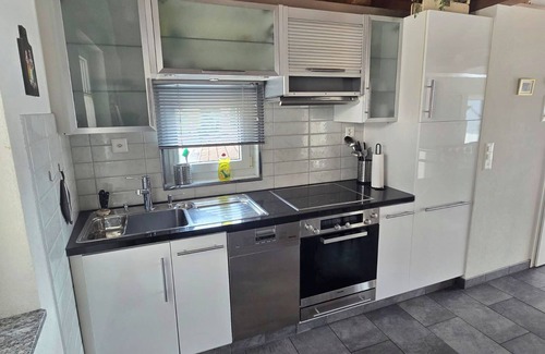 Brione sopra Minusio Apartment | Casa Santa Barbara: Stylish Swiss Holiday Home with Lake and Mountain Views