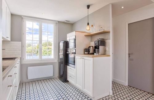 Merville-Franceville-Plage Apartment | Central Merville Franceville apartment with equipped kitchen