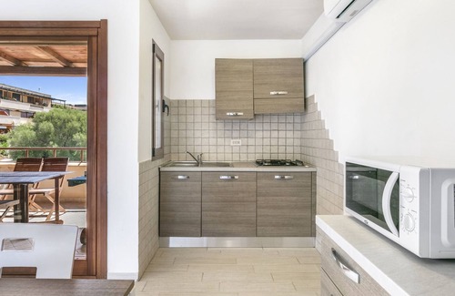 Portisco Apartment | Central Apartment ‘Bilocale Asfodeli 2’ Close to Beach with Balcony & Sea View