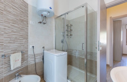 Villasimius Apartment | Central Apartment with Balcony, Wi-Fi and Air Conditioning