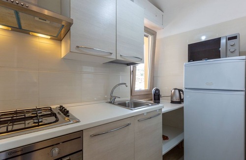 Villasimius Apartment | Central Apartment with Balcony, Wi-Fi and Air Conditioning