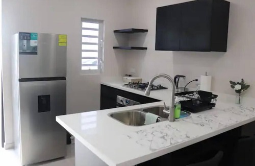 Marie Pampoen Apartment | Central Located 2 BR Near Mambo Bch - 10 min Walk2