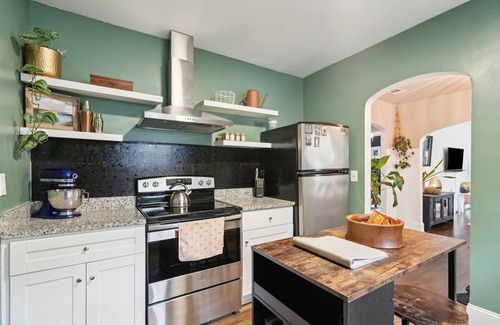 North Charleston House | Central pup-friendly ranch with vibrant interior, cozy deck & fenced backyard