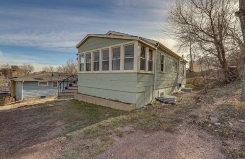 Rapid City House | Central Rapid City Home with Sunroom and Fireplace!