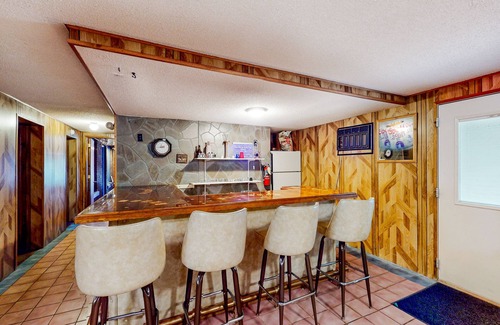 Madawaska House | Centrally located home near snowmobile trails with hot tub, sauna, & pool table