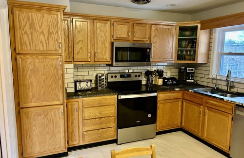 Avondale Melbourne Heights House | Centrally located retreat in Louisville! New hottub! Driveway and garage parking