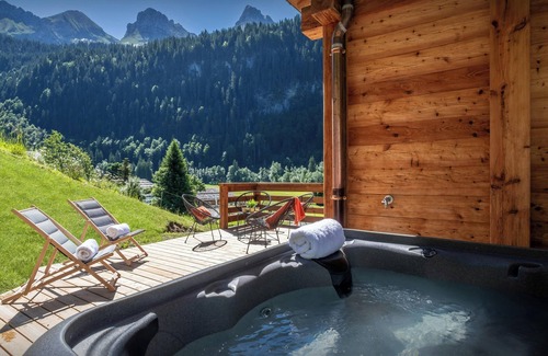 Le Grand-Bornand Ski Chalet | Chalet Angelia - modern ski home for 14, hot tub & views - OVO Network