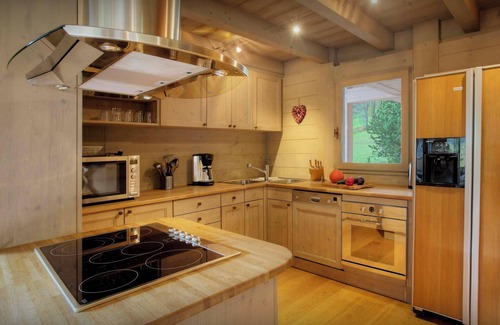 La Clusaz Ski Chalet | Chalet Fernuy - ski holiday for 10, hot tub & games room - OVO Network