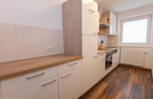 Konigsleiten Apartment | Chalet Hirsch is furnished in a rural style