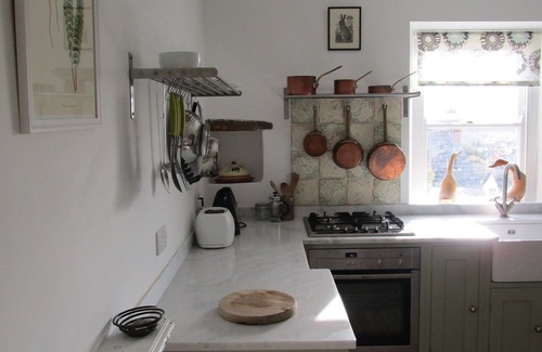 St Dogmaels Cottage | Character cottage in heart of village with stunning estuary view and garden