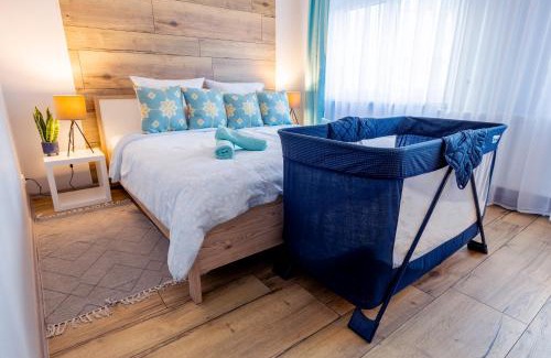 Heiligenwald Apartment | Charmantes Design-Apartment in Schiffweiler - Self-Check-in - 2 Parkplätze - WLAN - Balkon mit Gartenzugang - private Terrasse -ruhig gelegen - Nähe See & Wald - bis 4 Pers