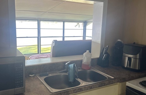 Andalusia Cabin | Charming 2-bedroom cabin a delightful home with beautiful waterfront views!