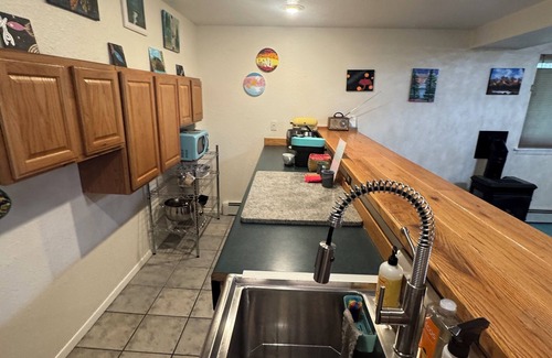 Alyeska Apartment | Charming 2-bedroom Girdwood Alyeska apartment with Hot Tub Walk to Slopes