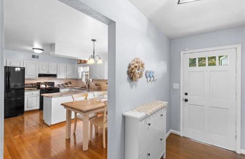 Portsmouth House | Charming 3-Bed Brick Home with Sunroom & Fireplace