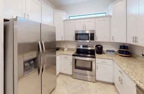 Port Charlotte Villa | Charming 3-bedroom villa in Port Charlotte with pool/gym, WIFI, dog friendly