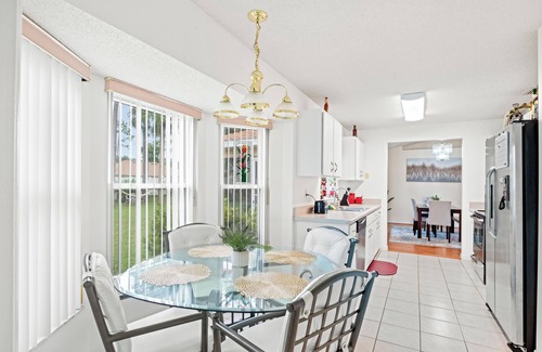 Palm Coast House | Charming 3-bedroom house with POOL, Firepit & WiFi/close to beach