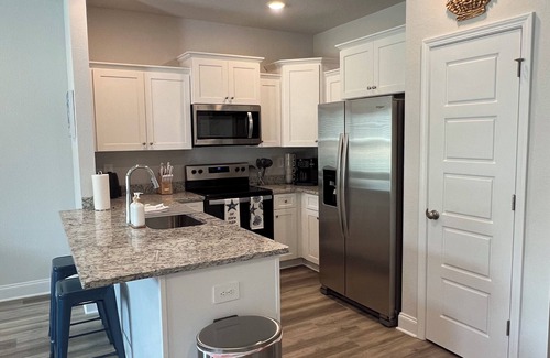 Gulfport House | Charming 3-bedroom townhome in Gulfport, central location, WiFi, in home laundry