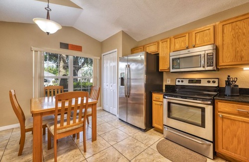 Lake Berkley Villa | Charming 3BR home in Kissimmee with private pool and lake view, perfect for families.