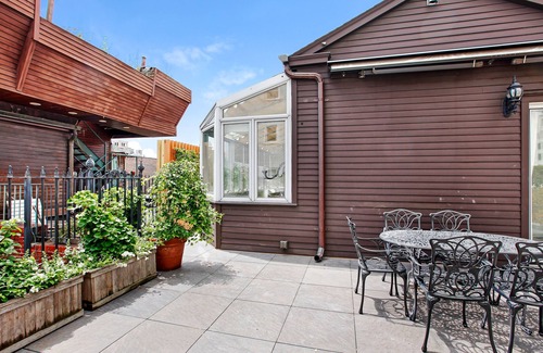 Ukrainian Village Apartment | Charming and Rustic "Rooftop Cottage" with Fireplaces and Outdoor Spaces