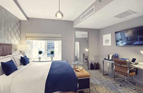 Financial District Hotel | Charming and Stylish Queen Bedded Room with Modern Comforts in Prime Location