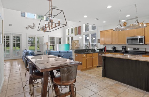 Laurel Grove House | Charming Beach Cottage with 6-Seat GOLF CART! Near Beach, Pool, Tram & Wharf.