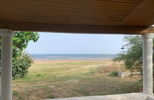 Katakolo House | Charming beachfront 2-bedroom house with AC and WiFi.
