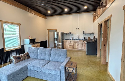 Benzonia House | Charming Brando in pleasant in the quiet and secluded woods.