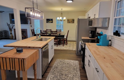 Chester House | Charming brick home set in the woods on 45 acres with pond and trails.