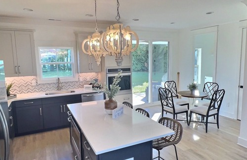 Winchester House | Charming Bungalow in beautiful Barefoot Bay - Fire pit, lakefront pool and more