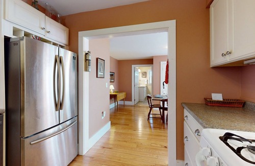 Bath House | Charming Cape-style House with Panoramic River Views and Modern Amenities