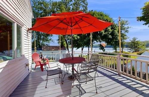 Bath House | Charming Cape-style House with Panoramic River Views and Modern Amenities