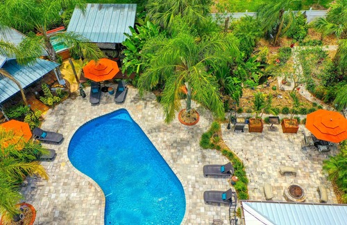 Fruit Cove Cottage | Charming cottage with shared pool, sauna, patio, grill & loft - dog-friendly