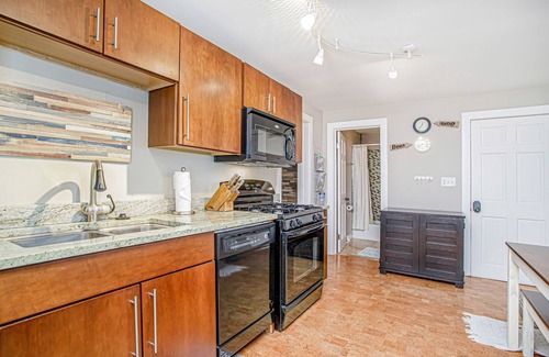 New Buffalo Cottage | Charming cottage with fast WiFi, fire pit, above-ground pool, & huge sunroom