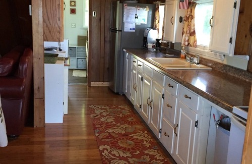 Traverse City Cottage | Charming, cozy cottage 10 feet from water's edge on Lake Leelanau.