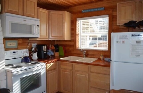 Nelscott Cottage | Charming Cozy Cottage w/OceanView! Steps to Beach! W/2 large decks and WiFi!