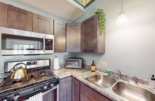 North Troy House | Charming dog-friendly riverside escape with deck, firepit & EV charger