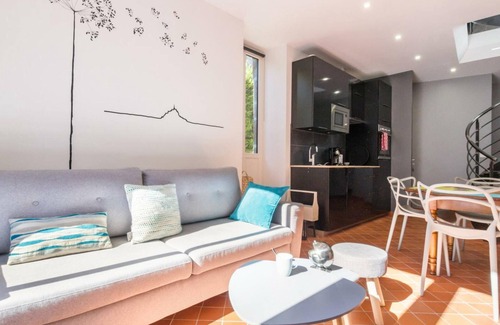 Avranches Apartment | Charming Duplex Loft in Historic Avranches with Private Terrace