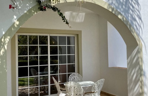 Praia da Luz Apartment | Charming garden apartment with generous verandah, 3 minutes walk from beach.