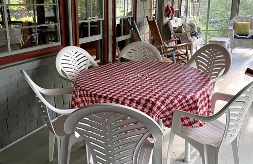 Rome Cabin | Charming lakefront cabin with large screened-in porch and lawn in Rome