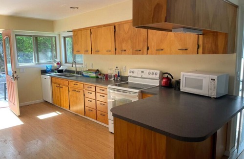 Gaston House | Charming, newly renovated 5-bedroom house with modern comfort and tranquility.