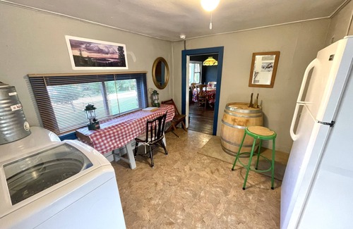 Polson Cabin | Charming rustic cabin with shared lake access and golf course views.